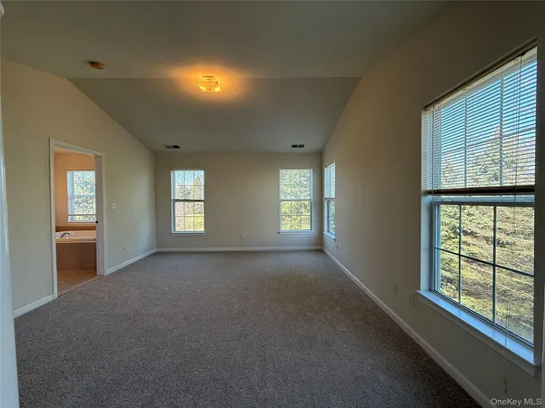 a view of a room that has a window