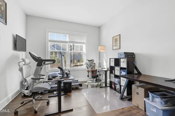a view of a workspace with furniture