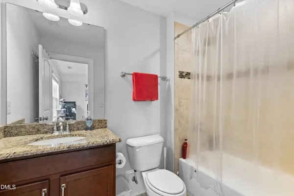 a view of a balcony with furniture