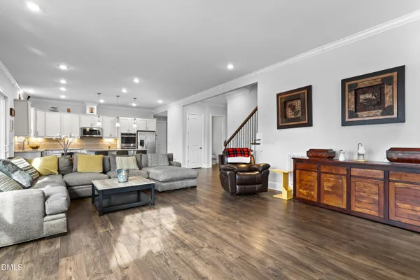 a kitchen with kitchen island a counter space and stainless steel appliances