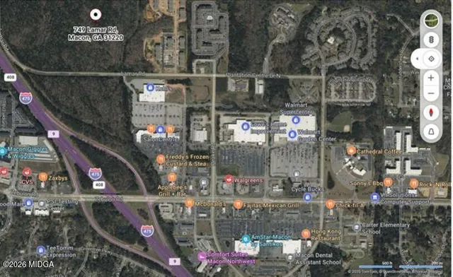 a view of swimming pool from a balcony