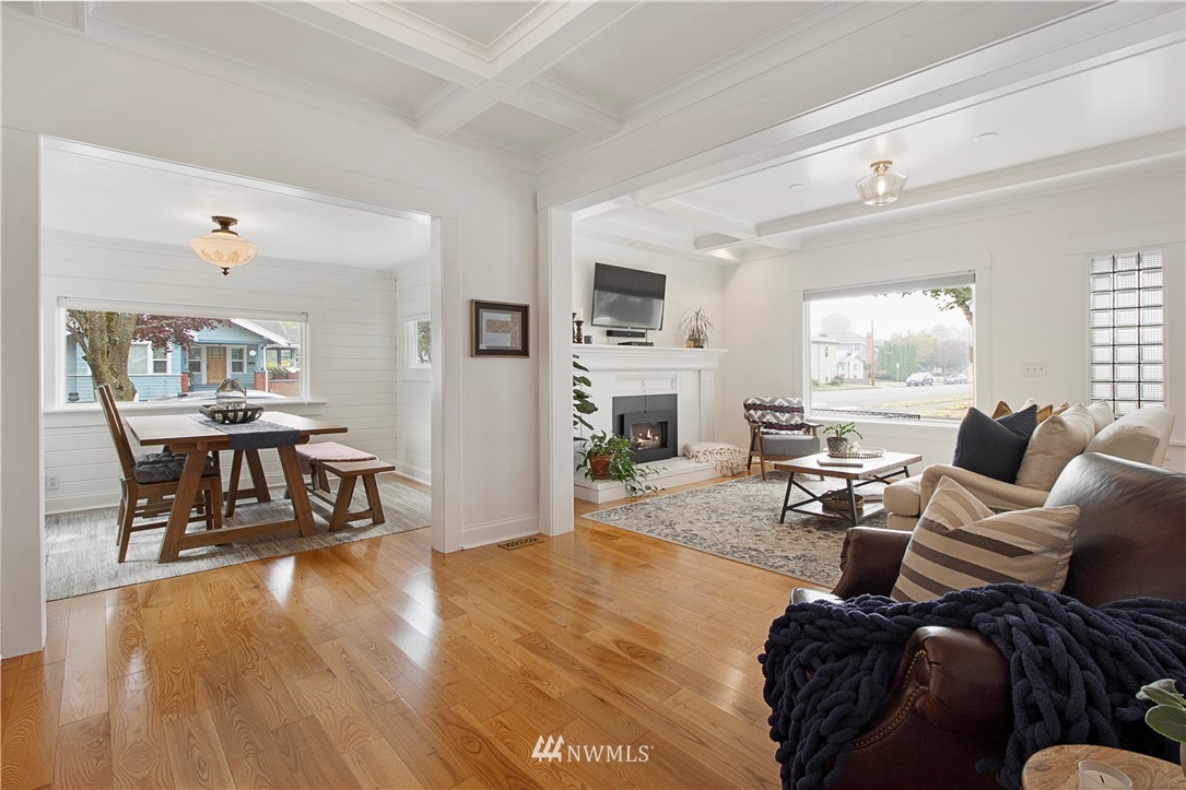 801 Ryan Avenue Sumner, WA 98390 - Photo 15 of 35 a living room with furniture and a fireplace