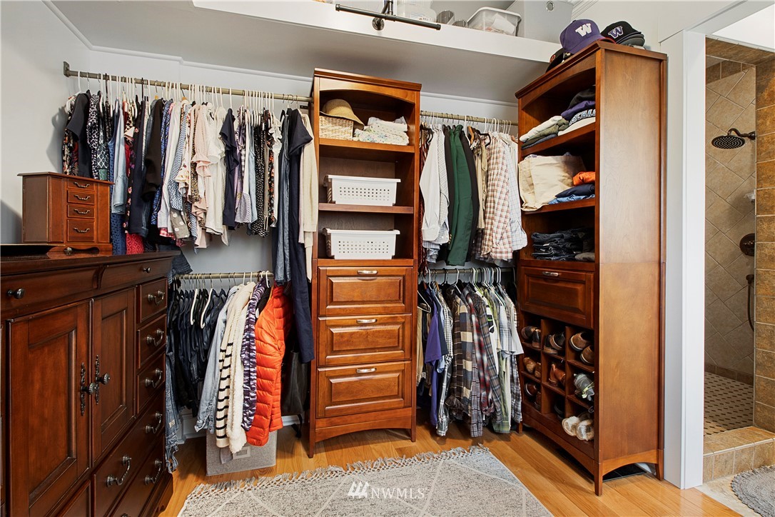 801 Ryan Avenue Sumner, WA 98390 - Photo 30 of 35 a view of walk in closet with clothes and shoes