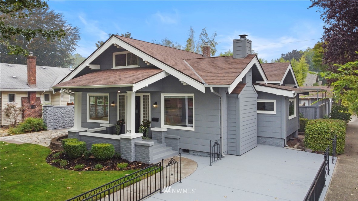 801 Ryan Avenue Sumner, WA 98390 - Photo 4 of 35 a front view of a house with a yard