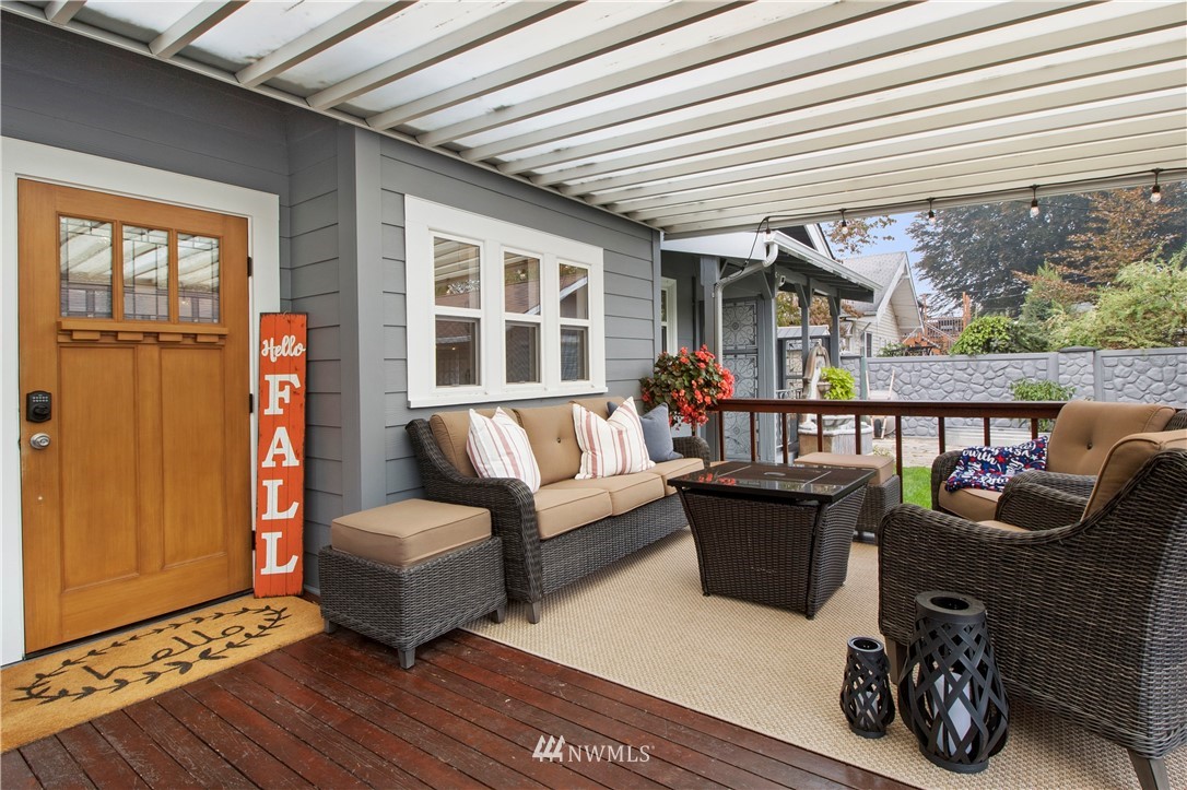 801 Ryan Avenue Sumner, WA 98390 - Photo 8 of 35 a outdoor living space with furniture and a potted plant