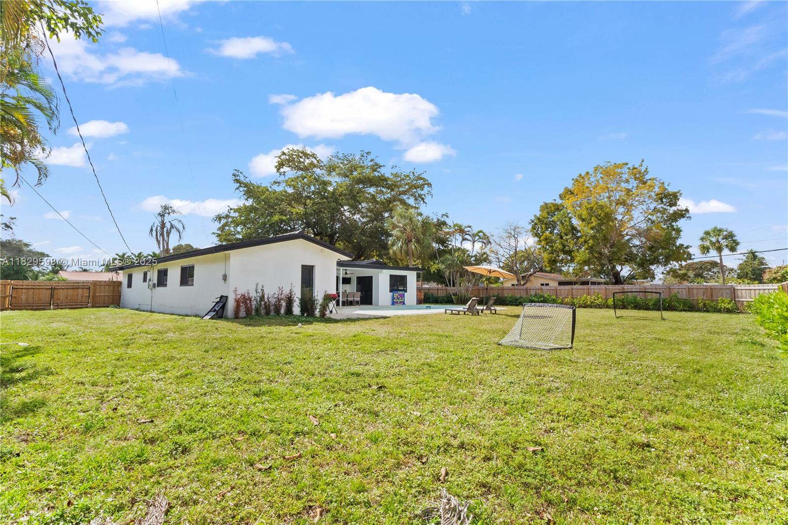 5131 Monroe Street Hollywood, FL 33021 - Photo 49 of 52 a house view with a garden space