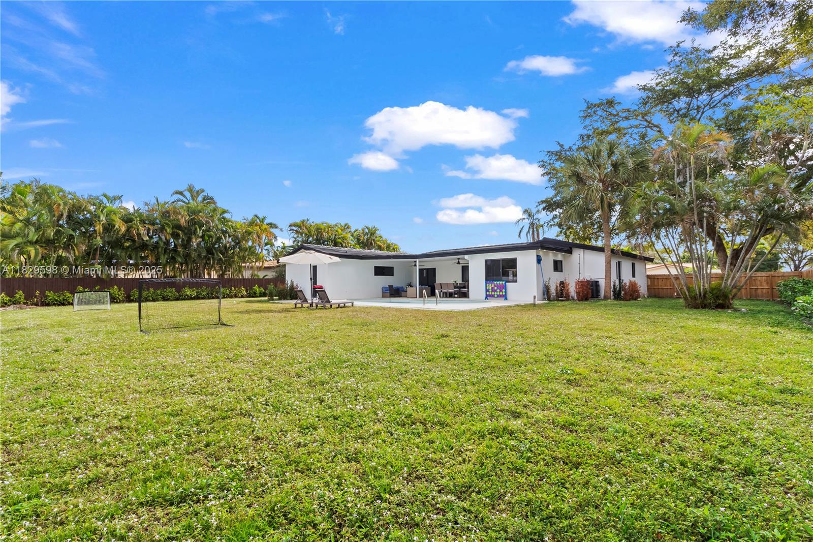 5131 Monroe Street Hollywood, FL 33021 - Photo 52 of 52 a front view of a house with a yard