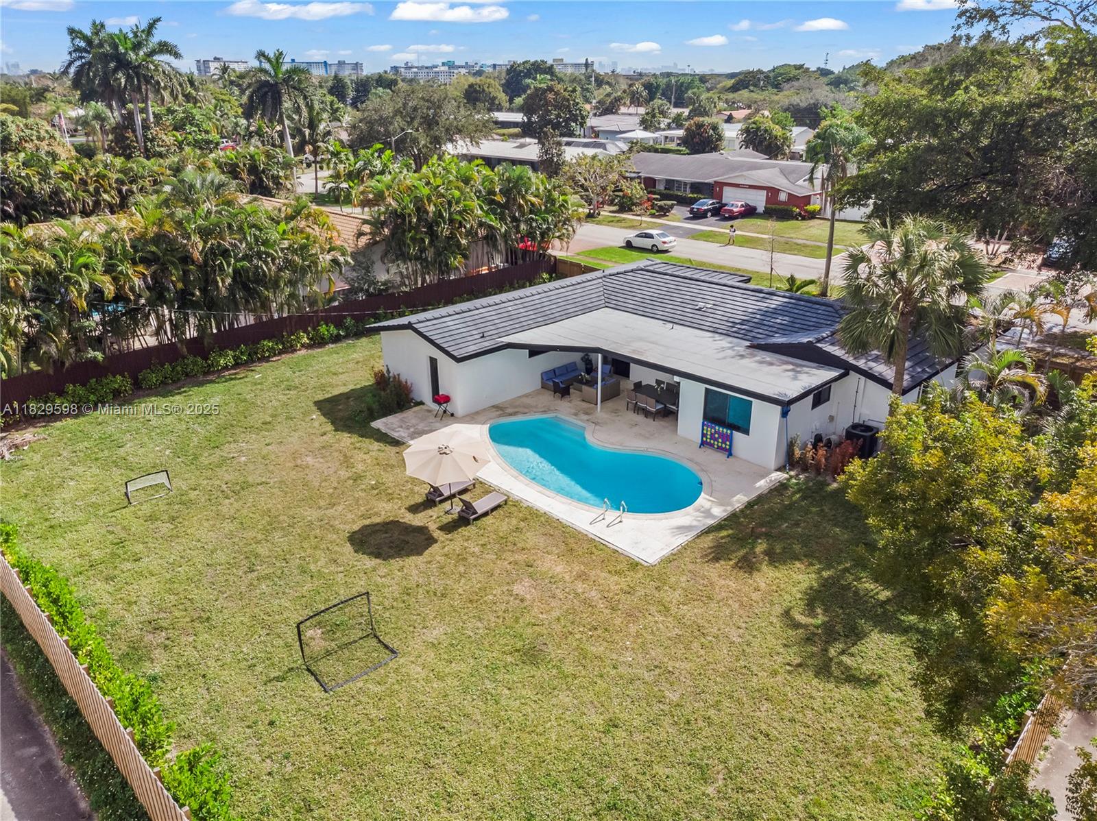 5131 Monroe Street Hollywood, FL 33021 - Photo 6 of 52 a view of a house with a yard