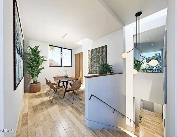 a bedroom with furniture and a chandelier