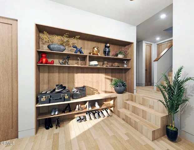 a bathroom with a toilet a sink and a mirror