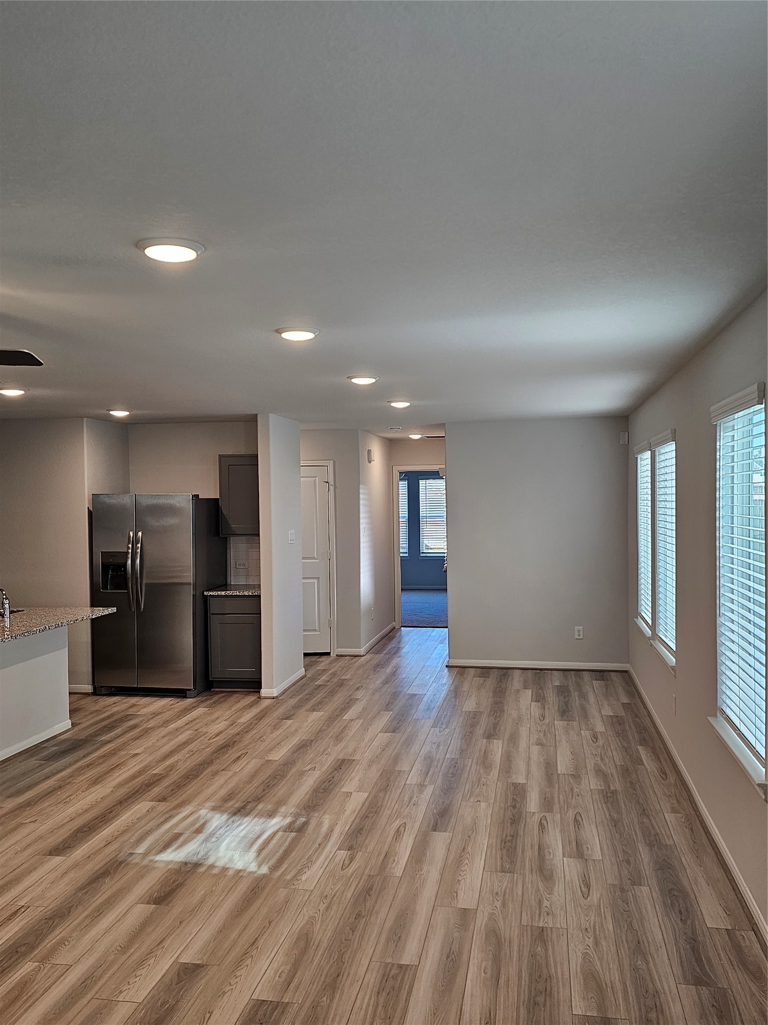 5207 Shallowhurst Lane Katy, TX 77449 - Photo 16 of 27 a view of a kitchen with a sink and a refrigerator