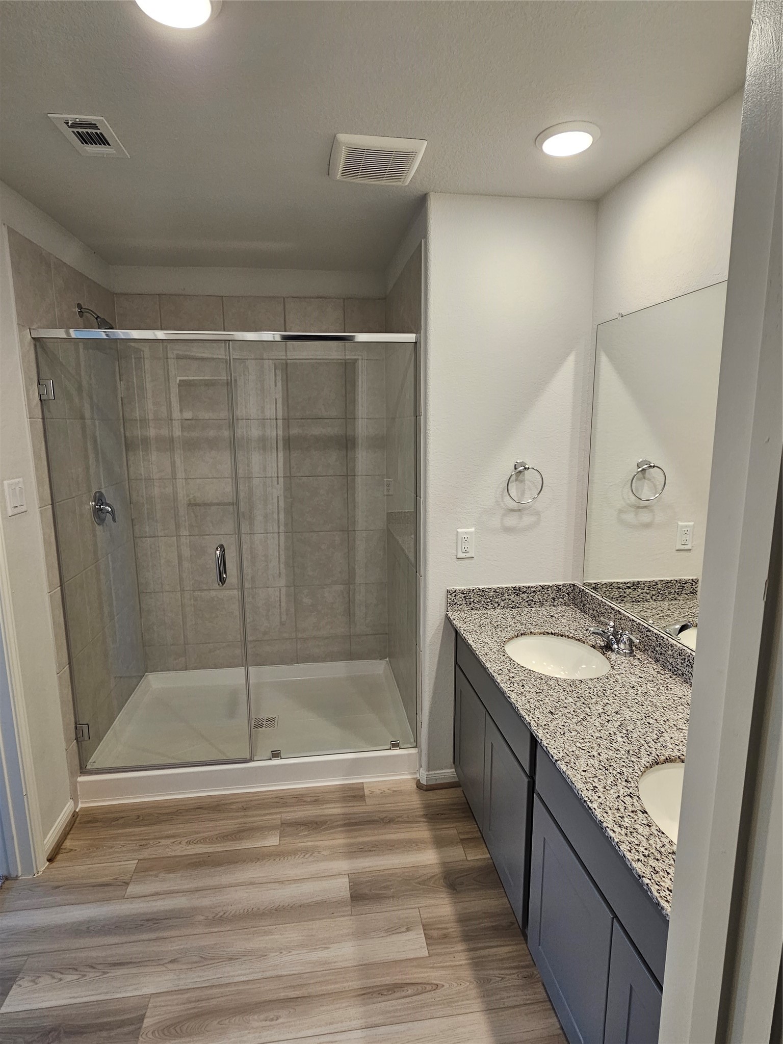 5207 Shallowhurst Lane Katy, TX 77449 - Photo 20 of 27 a bathroom with a granite countertop sink and shower