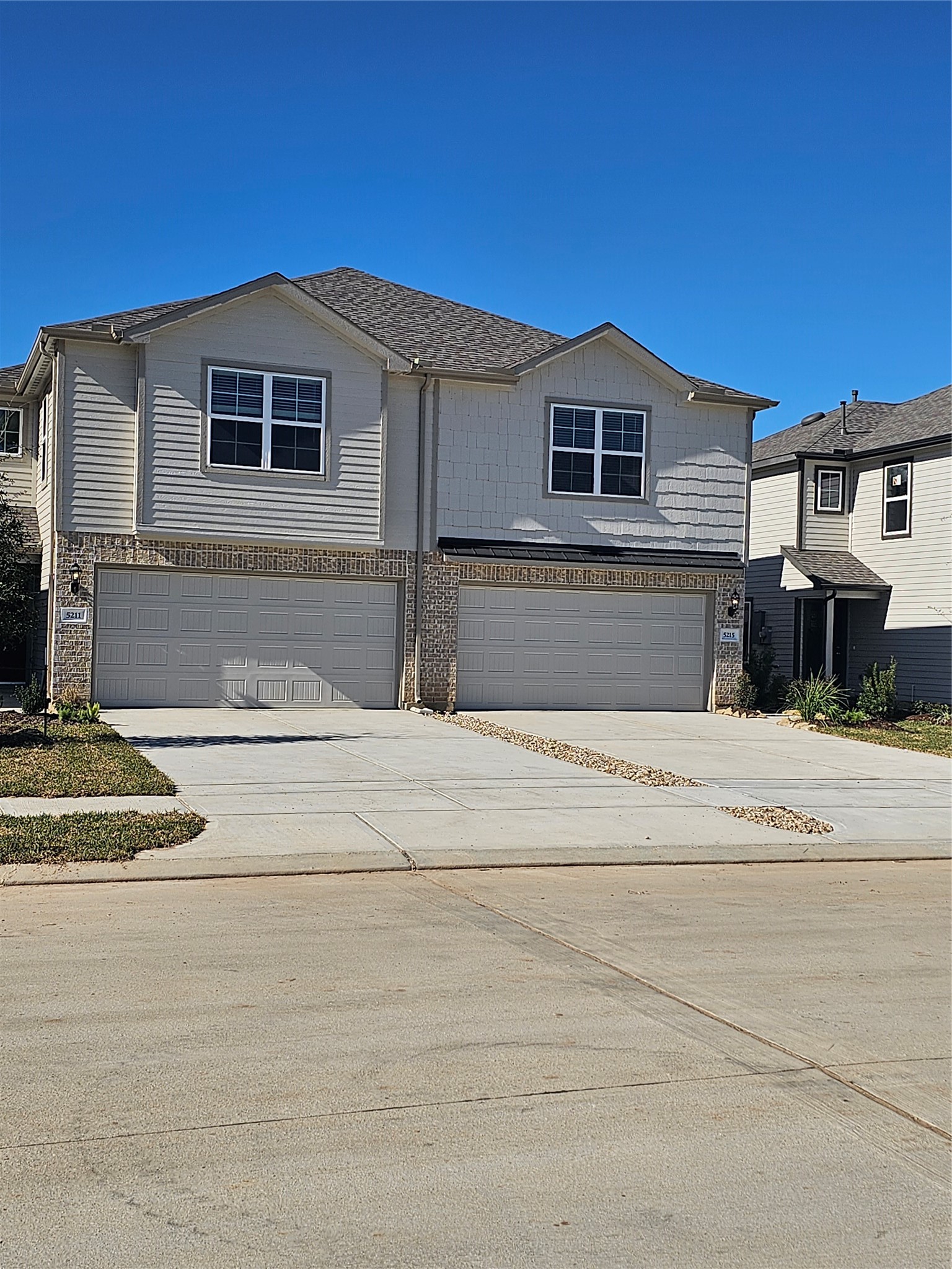 5207 Shallowhurst Lane Katy, TX 77449 - Photo 2 of 27 a front view of a house with a yard