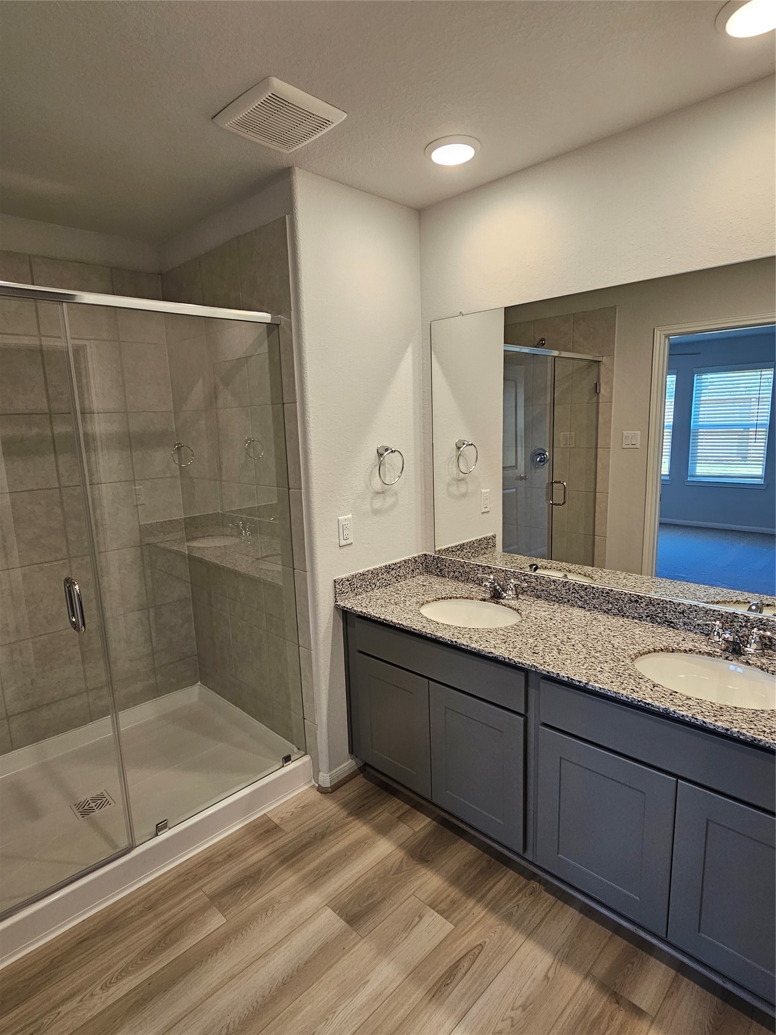 5207 Shallowhurst Lane Katy, TX 77449 - Photo 21 of 27 a bathroom with a granite countertop sink mirror and double