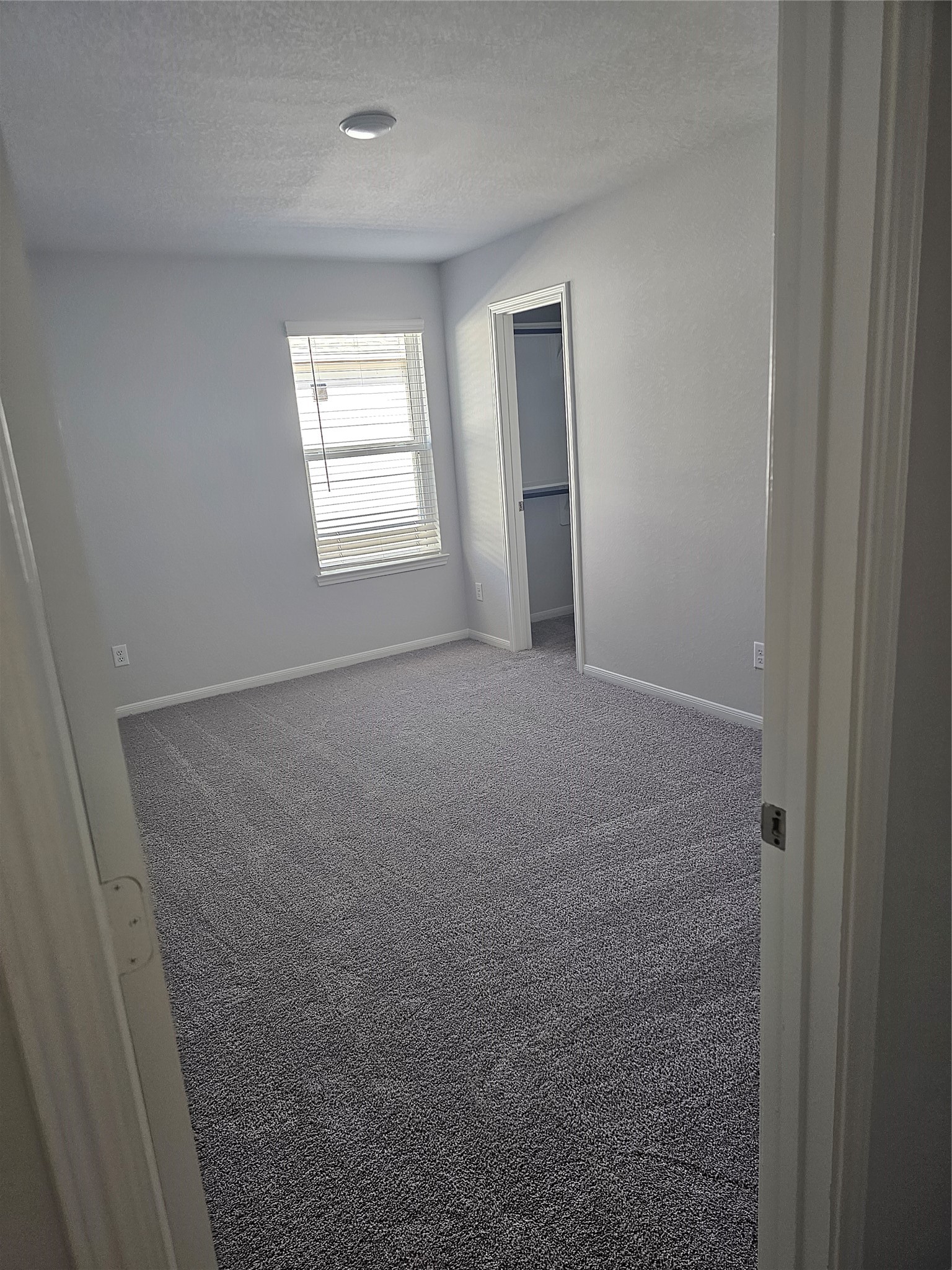 5207 Shallowhurst Lane Katy, TX 77449 - Photo 25 of 27 a view of empty room with windows