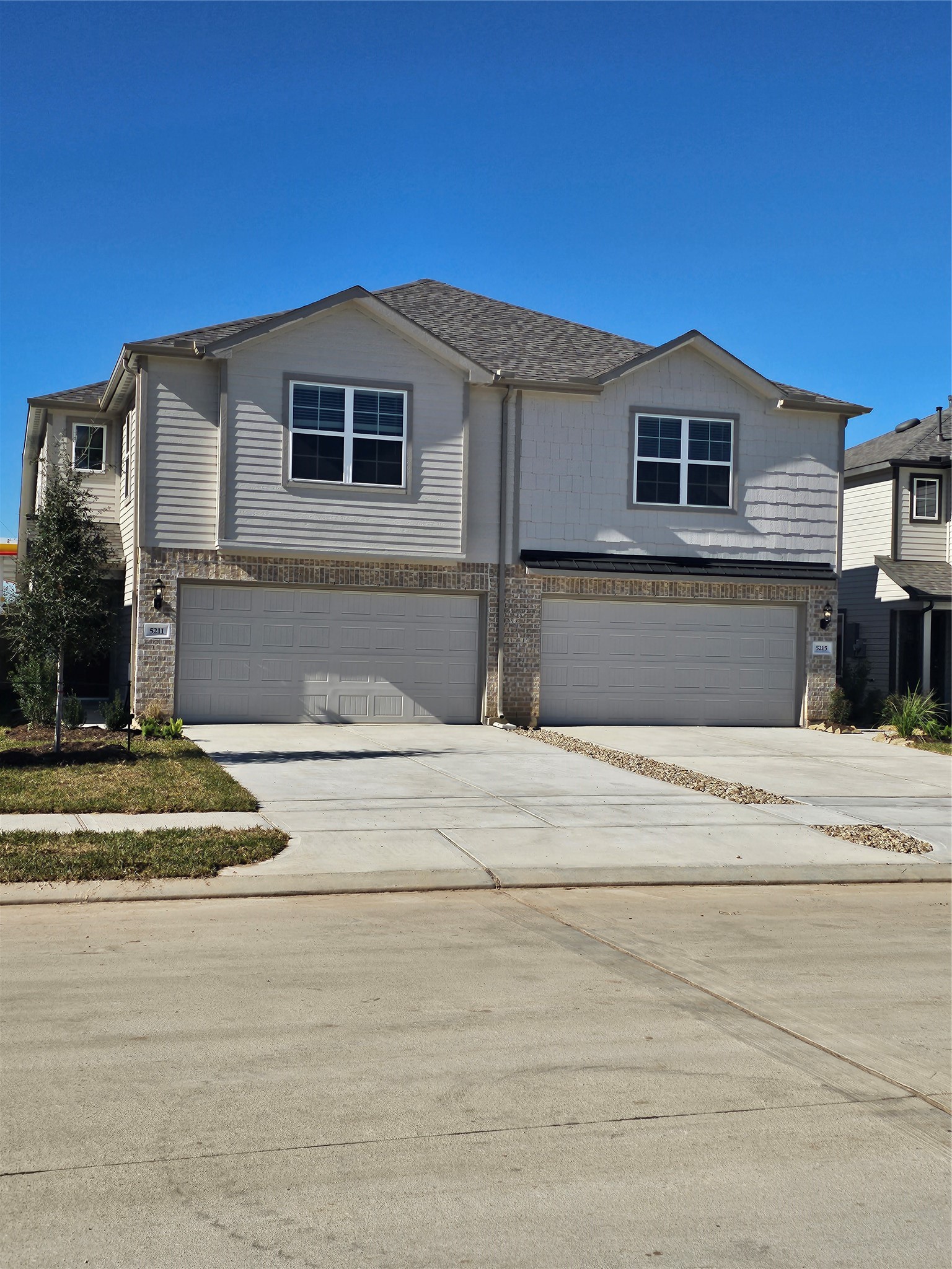 5207 Shallowhurst Lane Katy, TX 77449 - Photo 3 of 27 a front view of a house with a yard