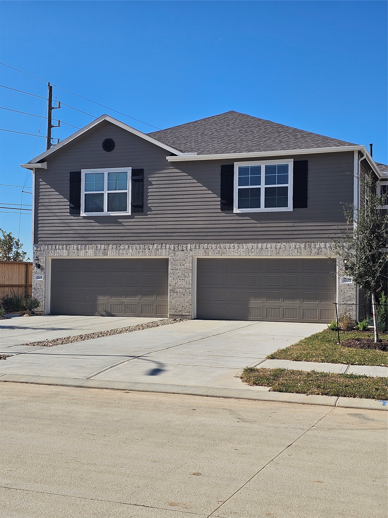 5207 Shallowhurst Lane Katy, TX 77449 - Photo 4 of 27 a front view of a house with a yard