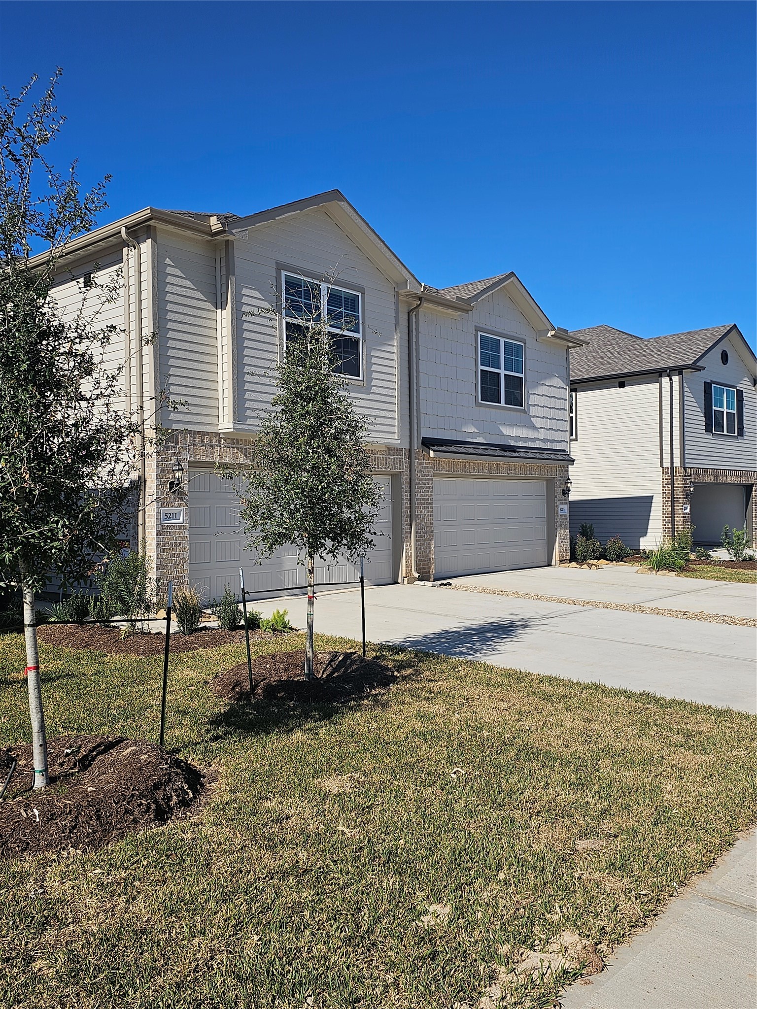 5207 Shallowhurst Lane Katy, TX 77449 - Photo 5 of 27 a front view of a house with a yard