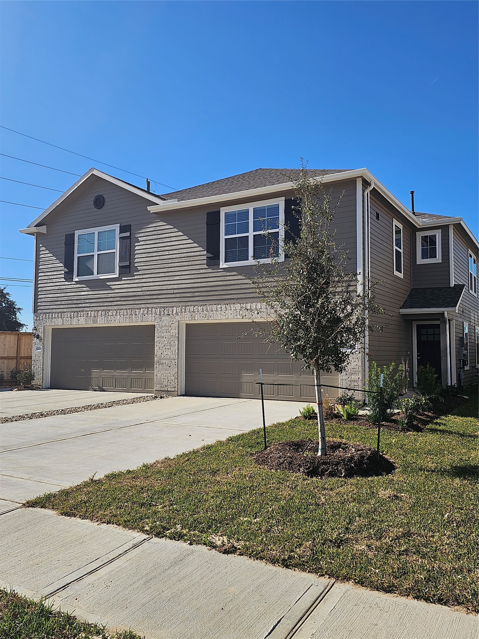 5207 Shallowhurst Lane Katy, TX 77449 - Photo 6 of 27 a front view of a house with a yard