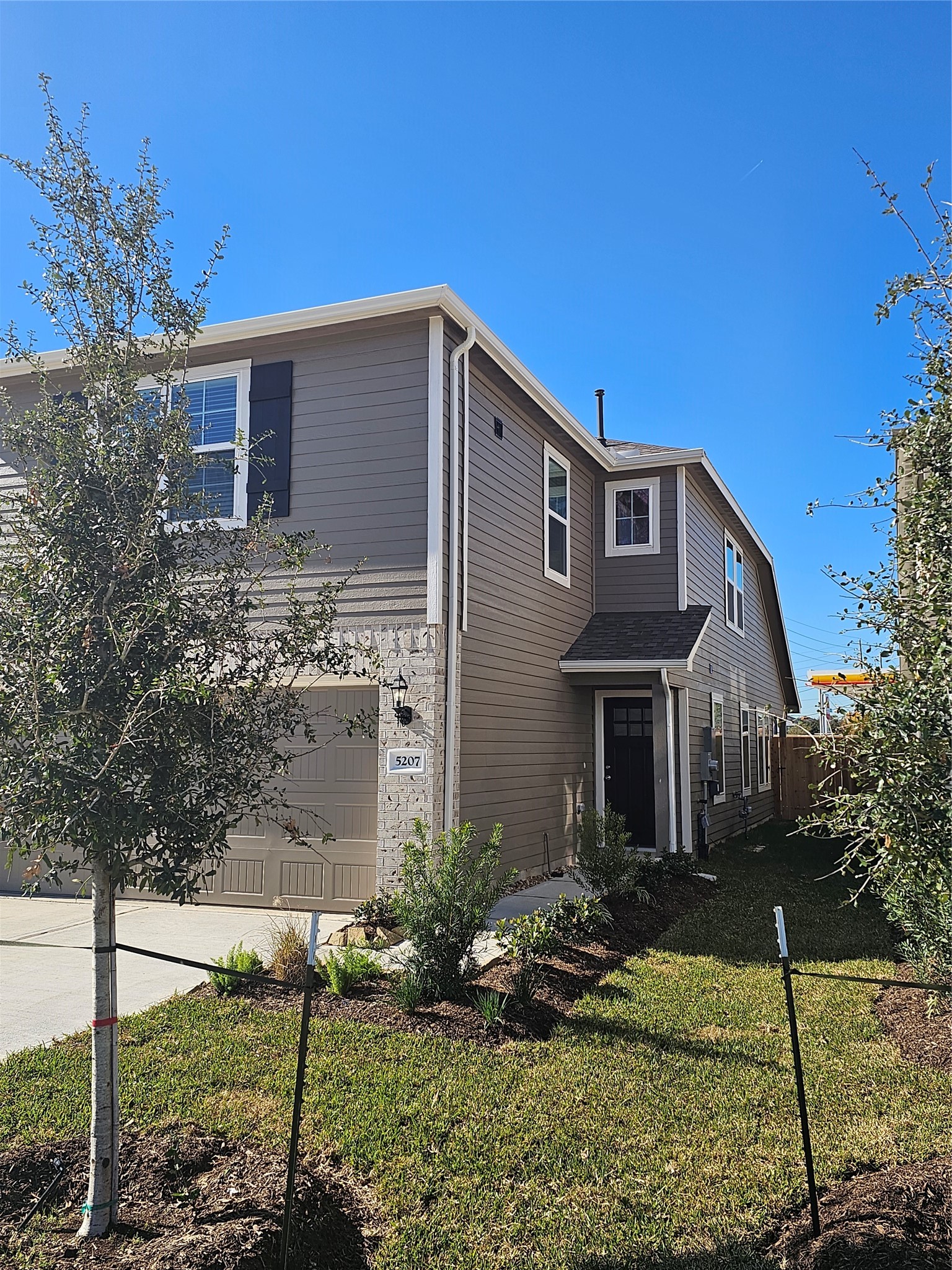 5207 Shallowhurst Lane Katy, TX 77449 - Photo 7 of 27 a front view of a house with garden