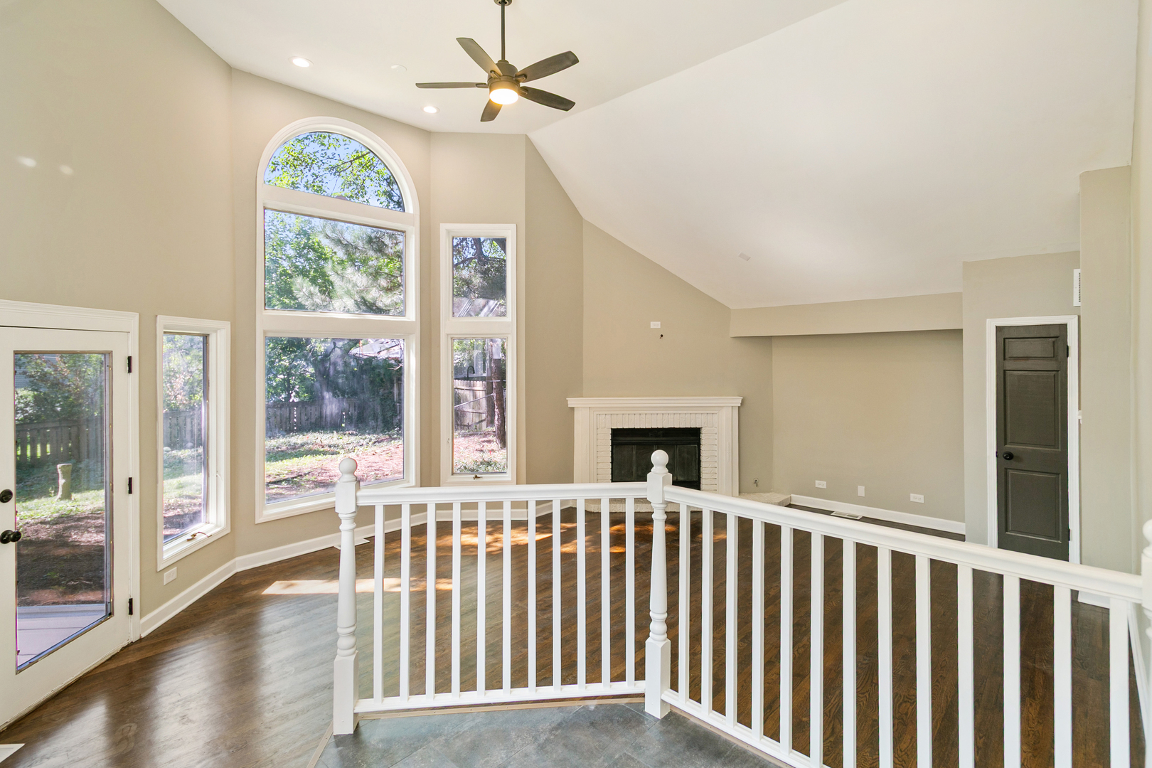 531 Winchester Road Chicago Heights, IL 60411 - Photo 9 of 28 a view of an empty room with a fireplace and a window