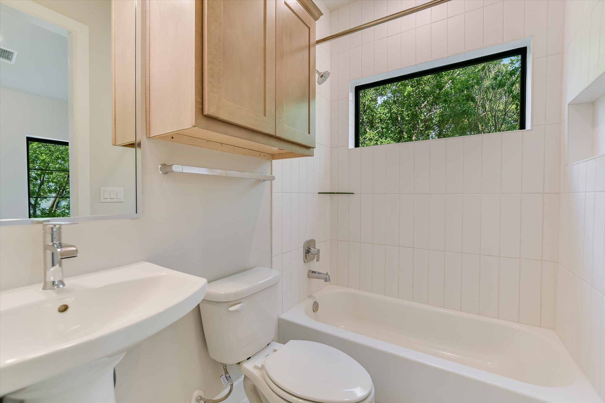 114 Lightsey Road, Unit 2 Austin, TX 78704 - Photo 14 of 14 Full bathroom featuring healthy amount of natural light and shower / bathtub combination