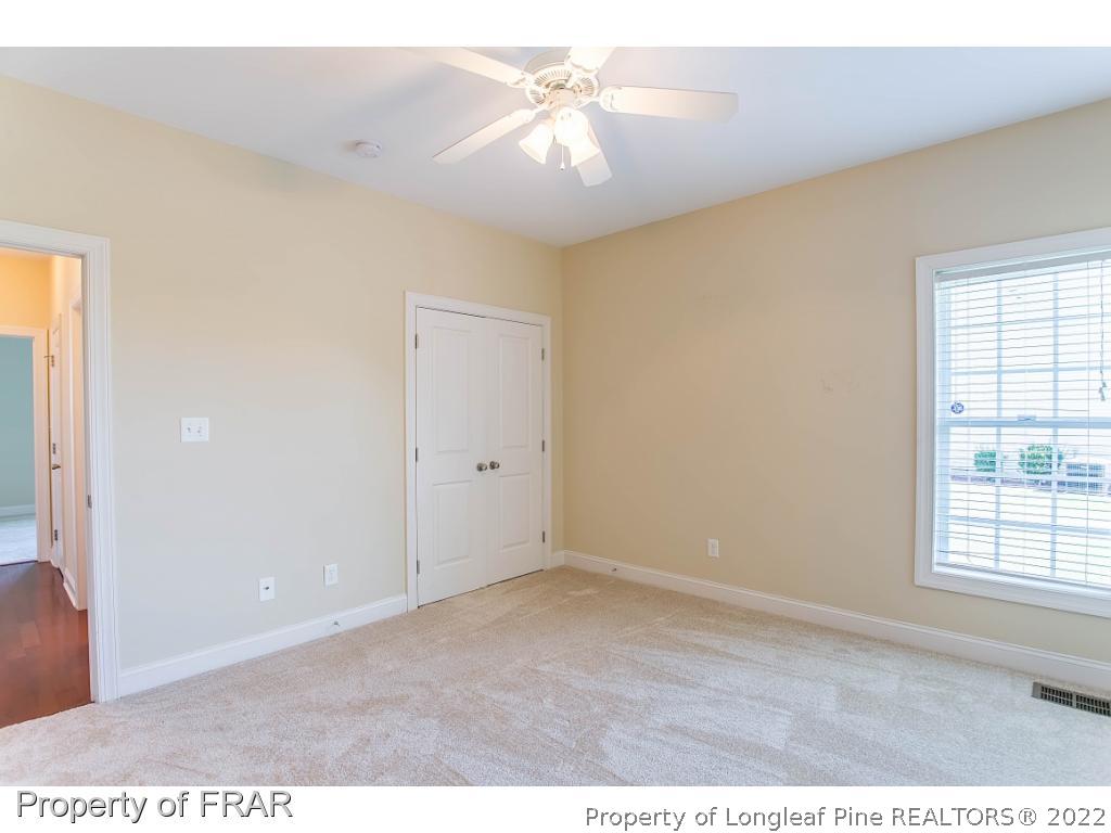 409 St Johns Loop Raeford, NC 28376 - Photo 9 of 36 a view of an empty room with a window