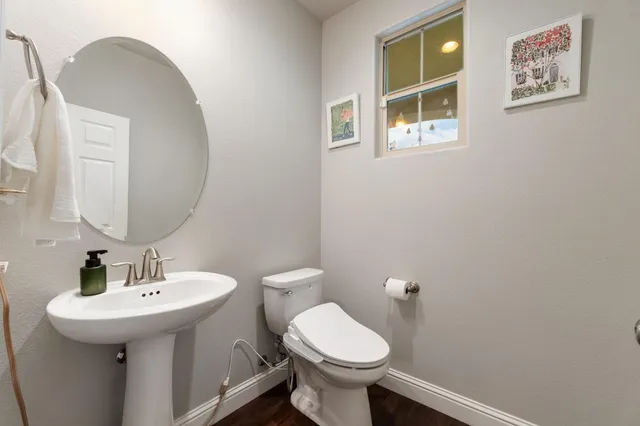 a bed room with a bed and a night stand