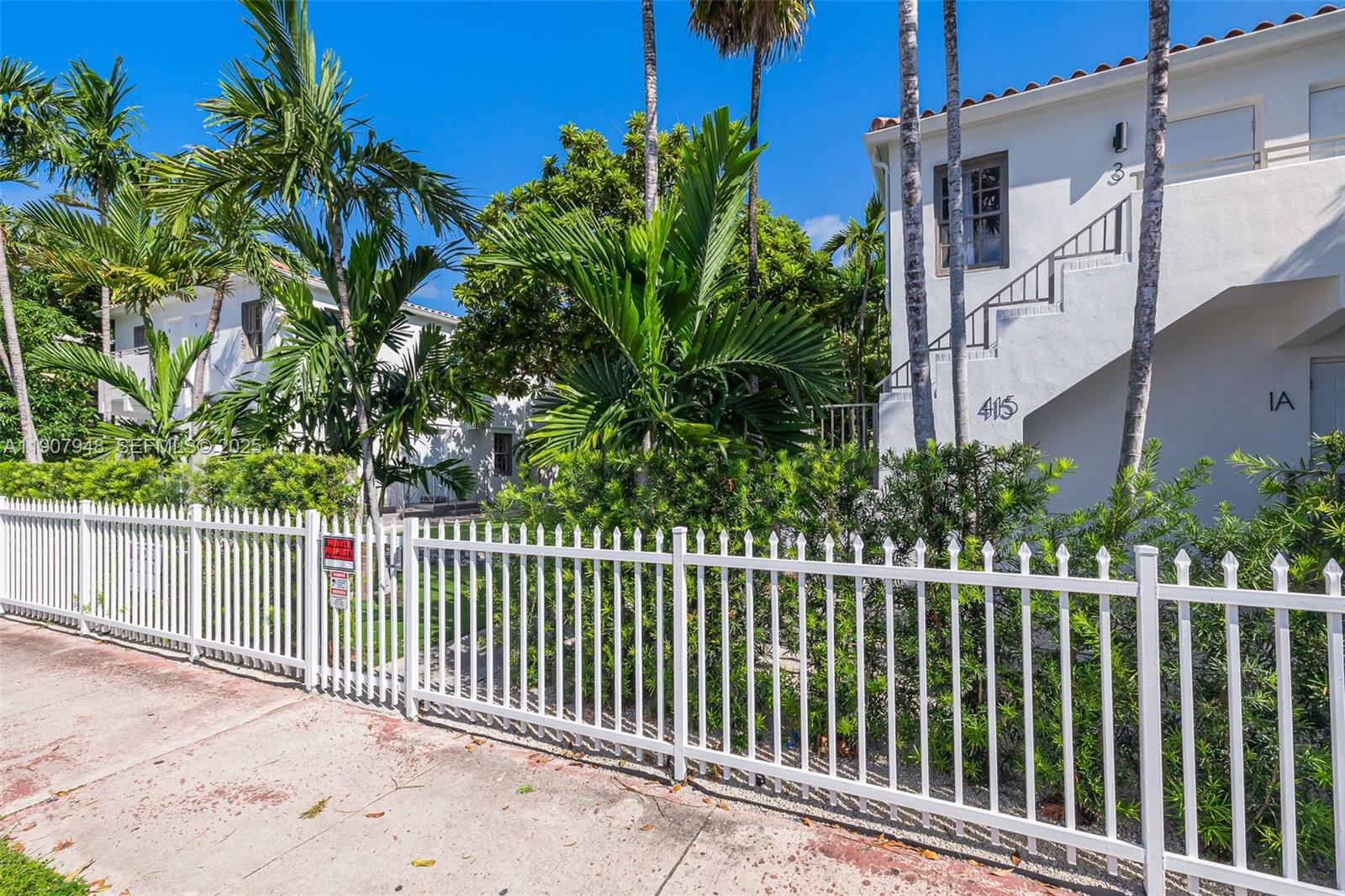 421 75th Street, Unit 3 Miami Beach, FL 33141 - Photo 18 of 21 a view of a fence