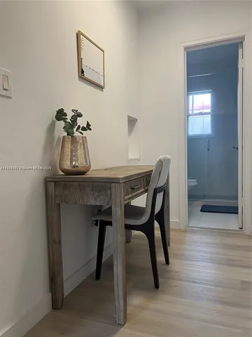 a view of a dining room with furniture
