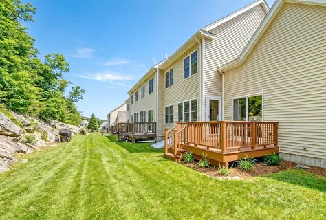 a view of backyard with deck