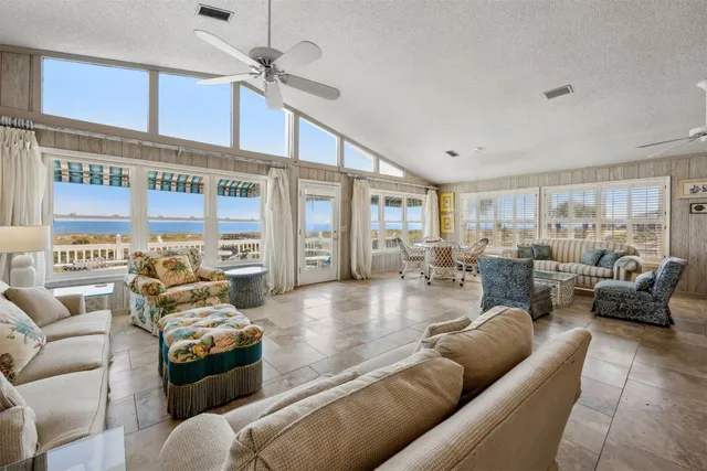 a living room with furniture and a table