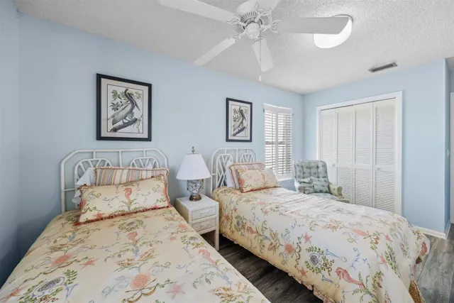 a kitchen with sink and cabinets