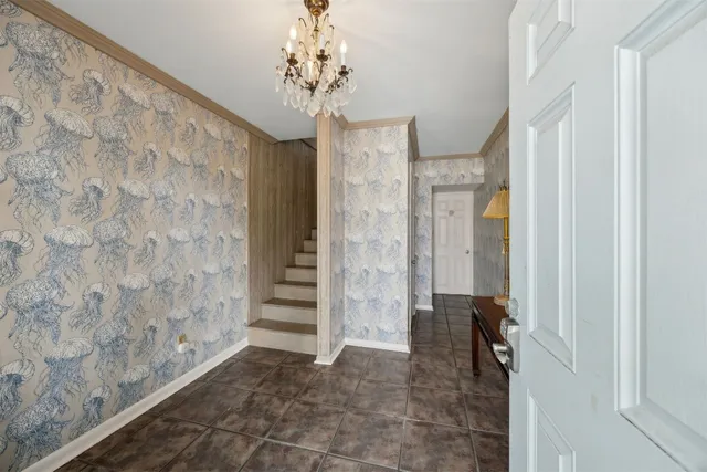 a view of a bathroom with a shower and a tub