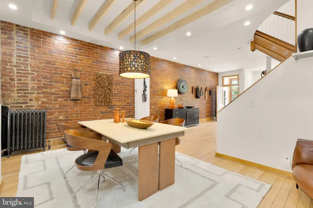 a view of a livingroom with furniture and window