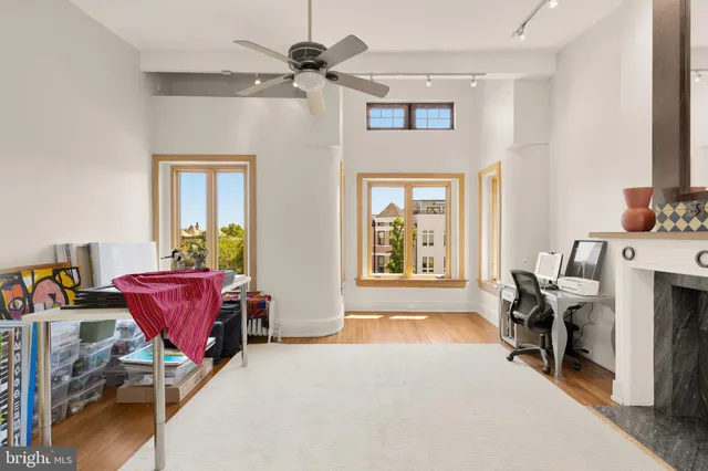 a living room with furniture and a table
