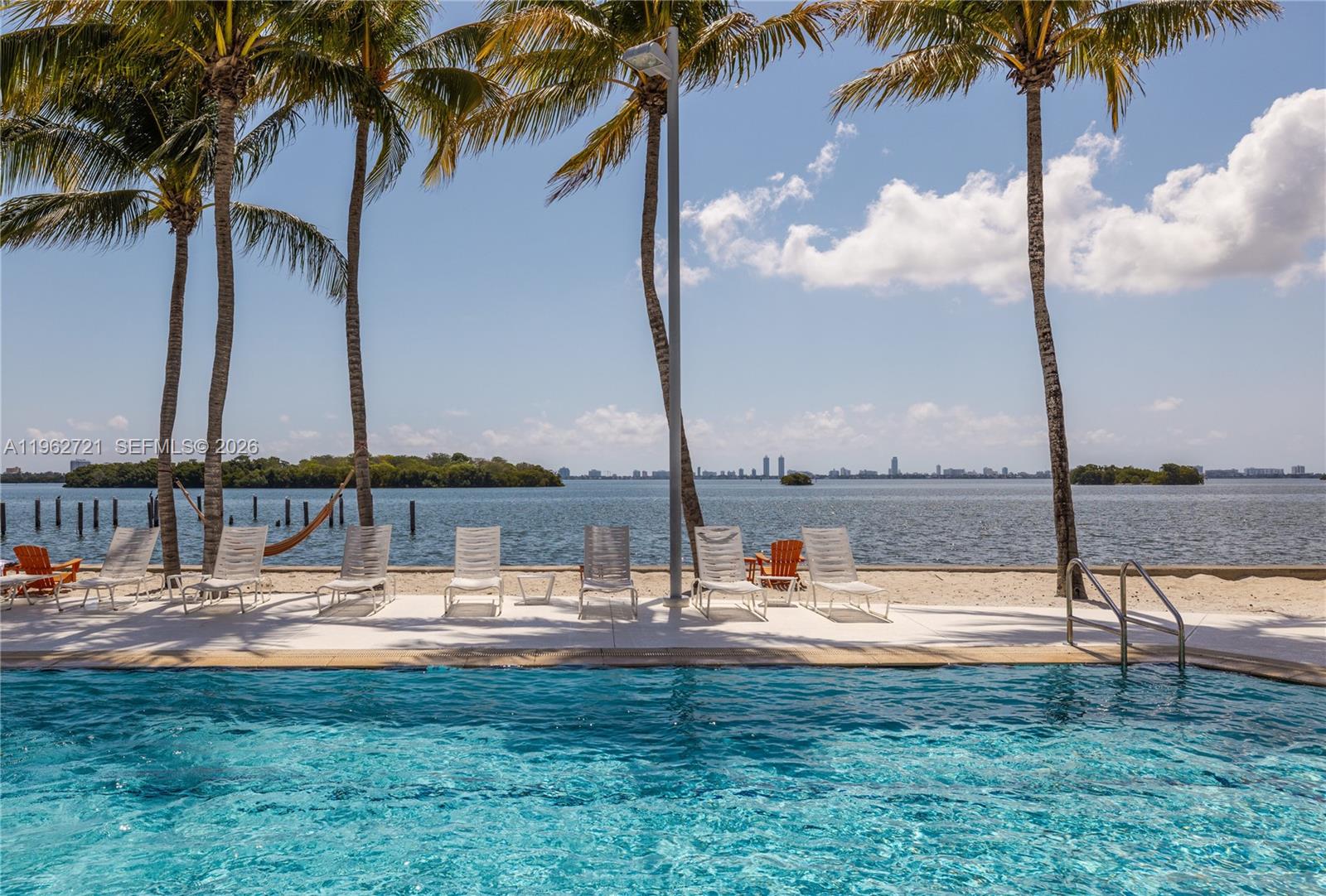 680 Northeast 64th Street, Unit APH3 Miami, FL 33138 - Photo 50 of 77 a view of swimming pool with outdoor seating