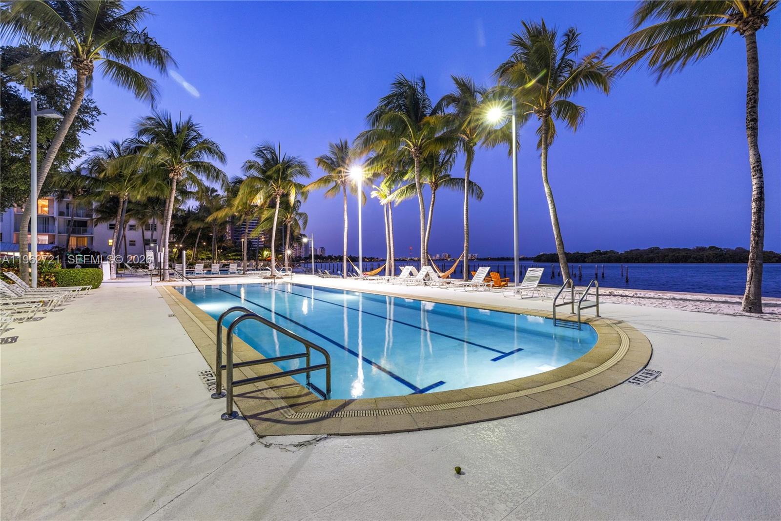 680 Northeast 64th Street, Unit APH3 Miami, FL 33138 - Photo 69 of 77 a view of swimming pool with chairs
