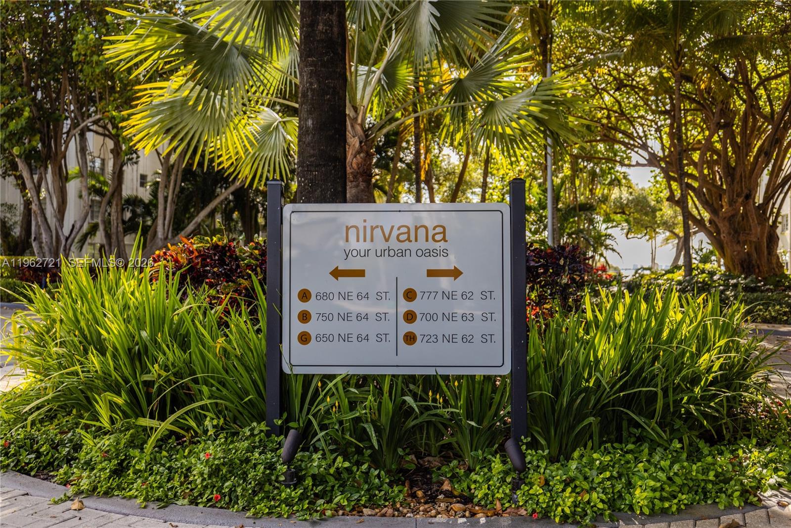 680 Northeast 64th Street, Unit APH3 Miami, FL 33138 - Photo 76 of 77 a sign on the side of a road