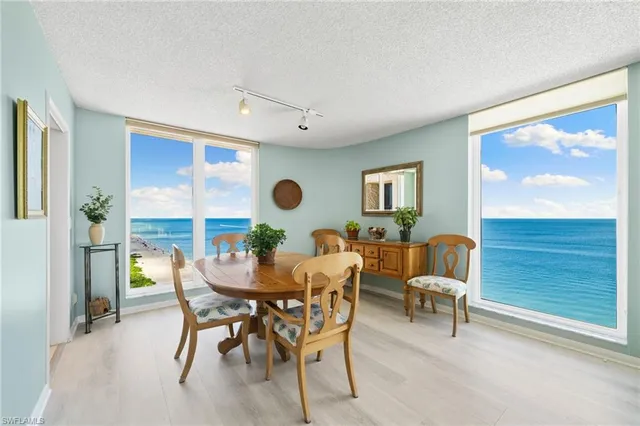 a view of a livingroom with furniture and front door