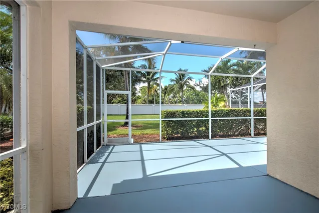 a view of a room with window and stairs