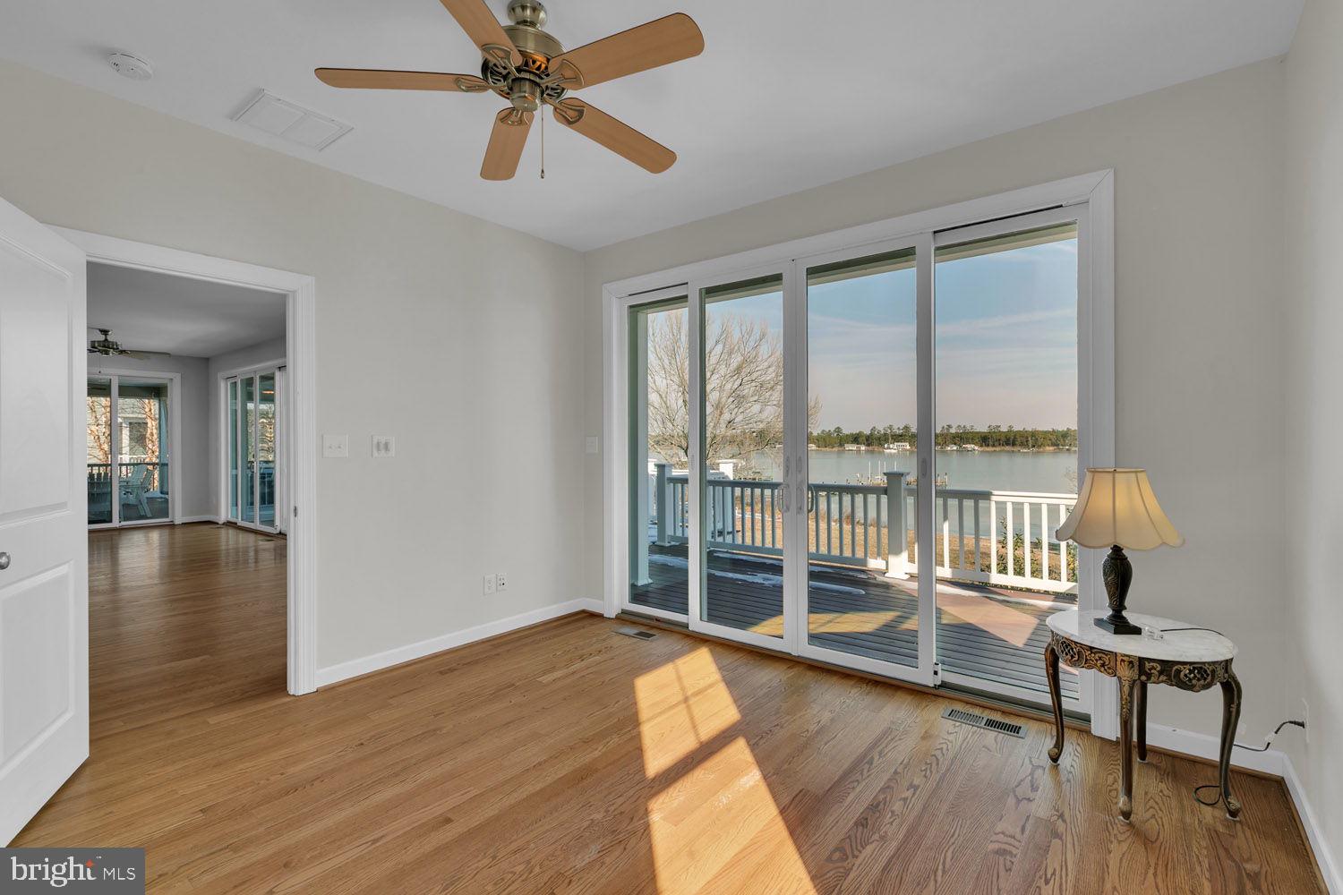 1469 Cowart Road Lottsburg, VA 22511 - Photo 28 of 54 a view of a room with wooden floor and a window