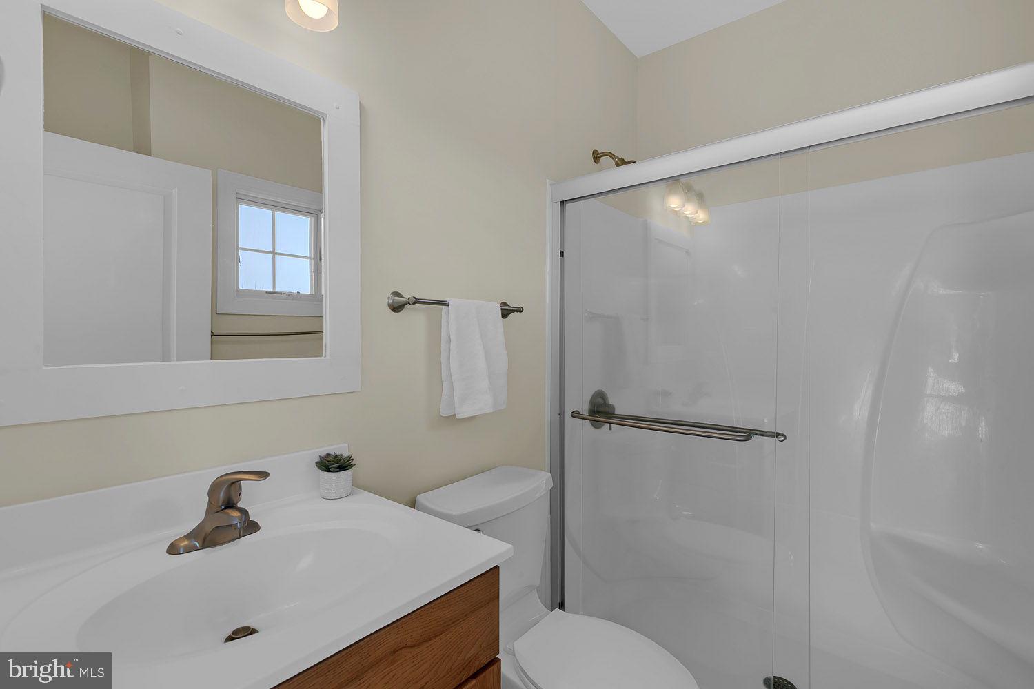 1469 Cowart Road Lottsburg, VA 22511 - Photo 32 of 54 a bathroom with a sink toilet and shower