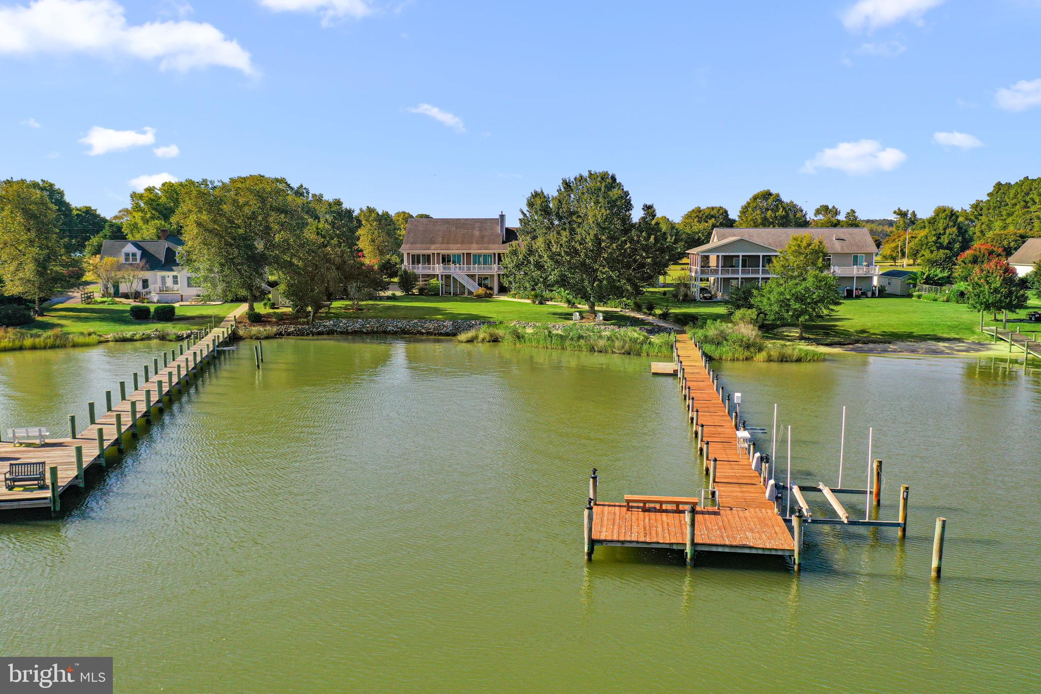 1469 Cowart Road Lottsburg, VA 22511 - Photo 47 of 54 a view of a lake with a mountain view