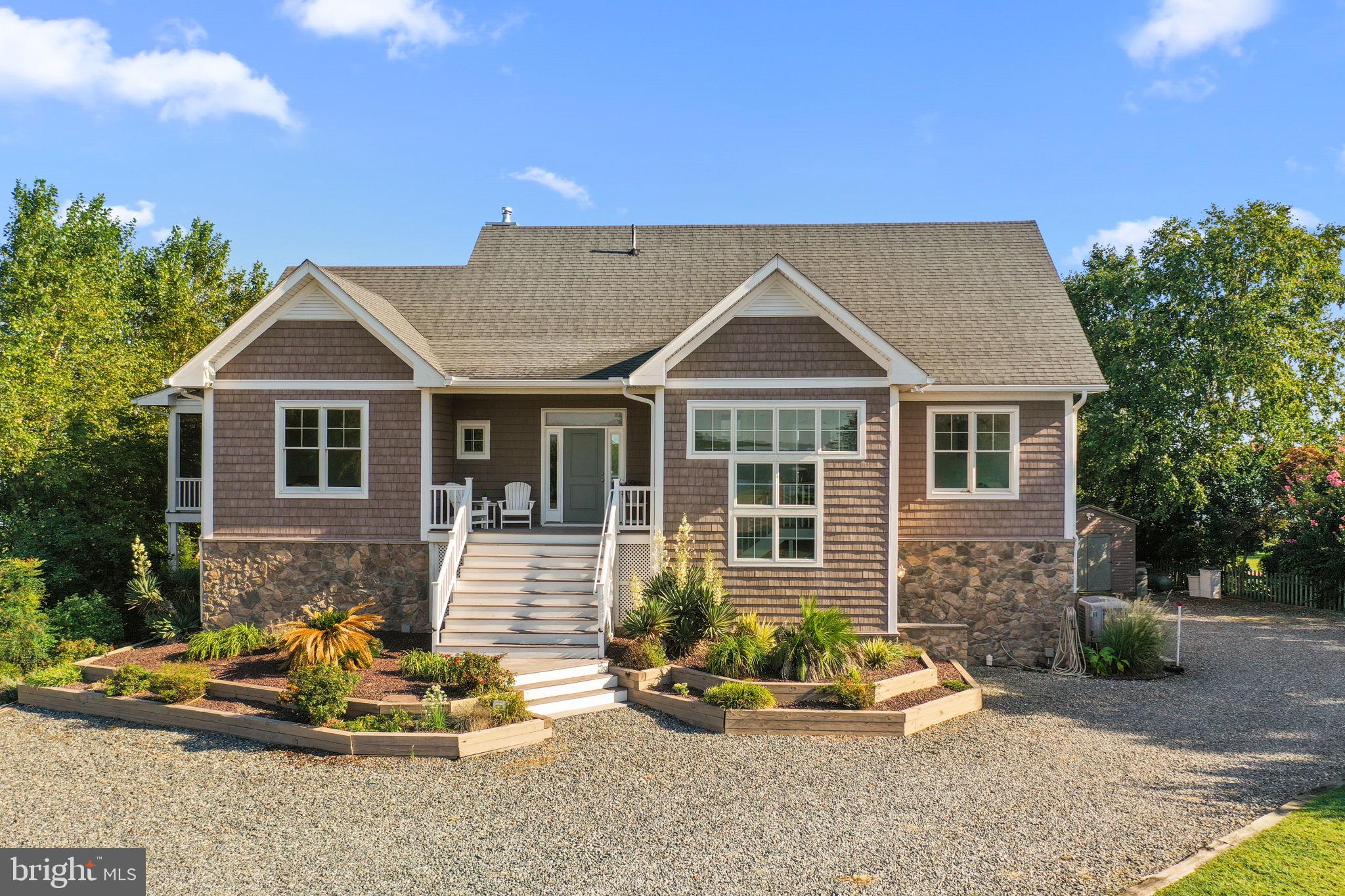 1469 Cowart Road Lottsburg, VA 22511 - Photo 6 of 54 a front view of a house with sitting area