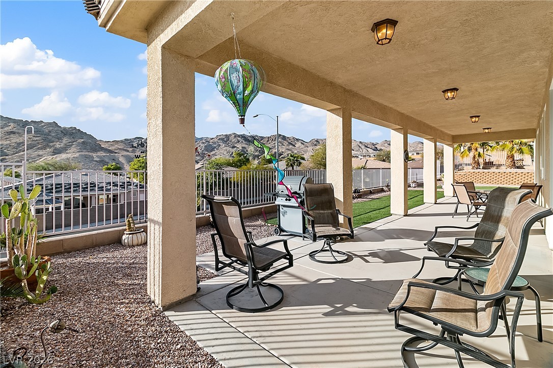 3505 Cottage Meadow Way Laughlin, NV 89029 - Photo 78 of 98 Here we see the back covered patio of the Home and the encompassing views.