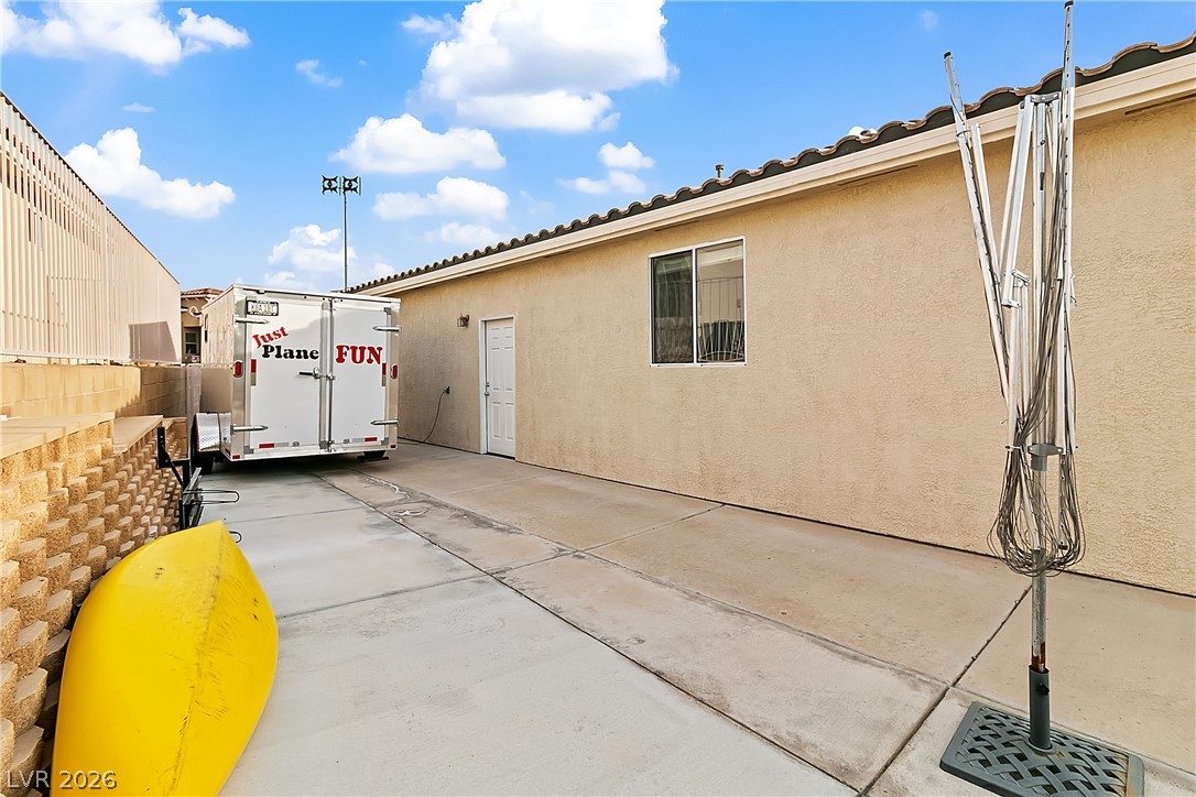 3505 Cottage Meadow Way Laughlin, NV 89029 - Photo 89 of 98 Room for boat or trailer on the side of the home, secured behind gate.