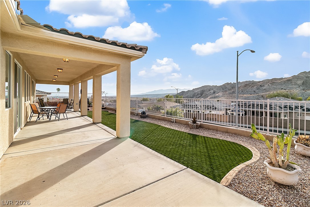 3505 Cottage Meadow Way Laughlin, NV 89029 - Photo 96 of 98 Professionally decorated yard with artificial grass.