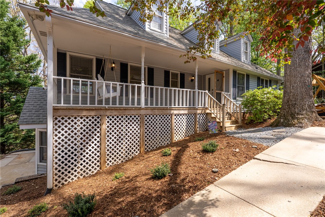 1002 Whitfield Point Road Anderson, SC 29626 - Photo 13 of 49 This charming home features a welcoming porch, perfect for enjoying peaceful outdoor moments.