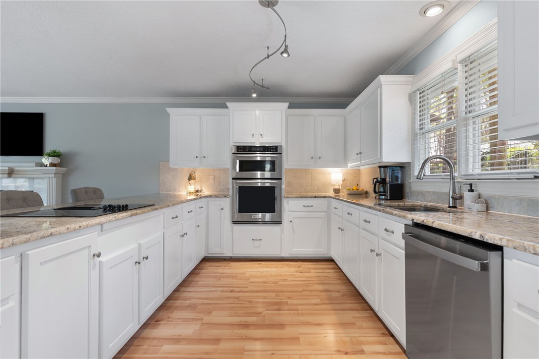 1002 Whitfield Point Road Anderson, SC 29626 - Photo 25 of 49 This spacious kitchen offers ample counter space and modern appliances for culinary pursuits.